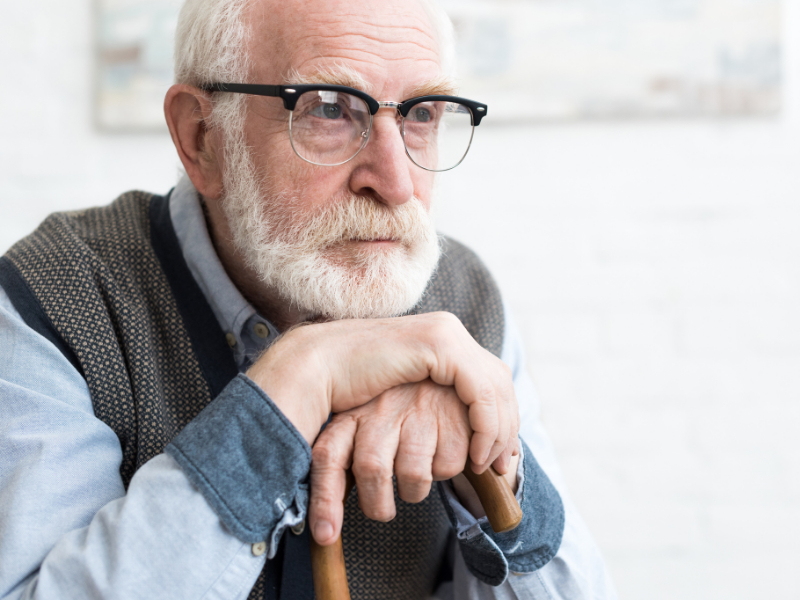 Senior person looking thoughtful